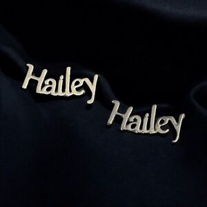 Silver tone name Hailey stud earrings